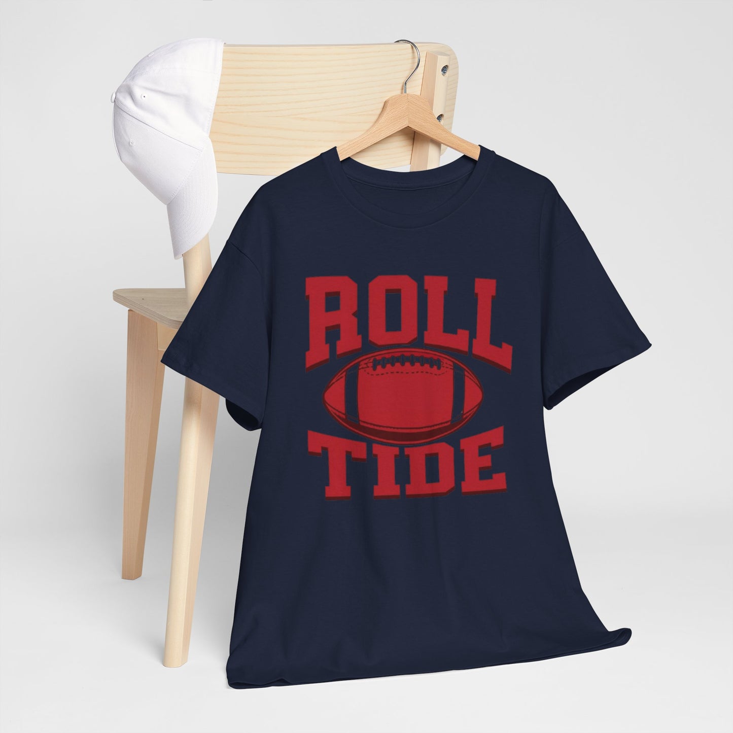 Navy blue t-shirt with red 'ROLL TIDE' graphic on a wooden chair.