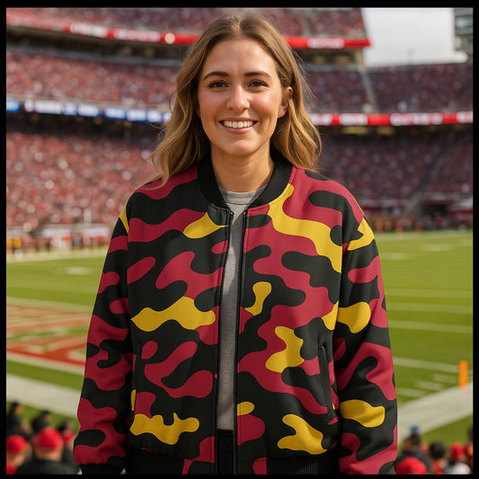 Woman wearing a colorful jacket on a sports field