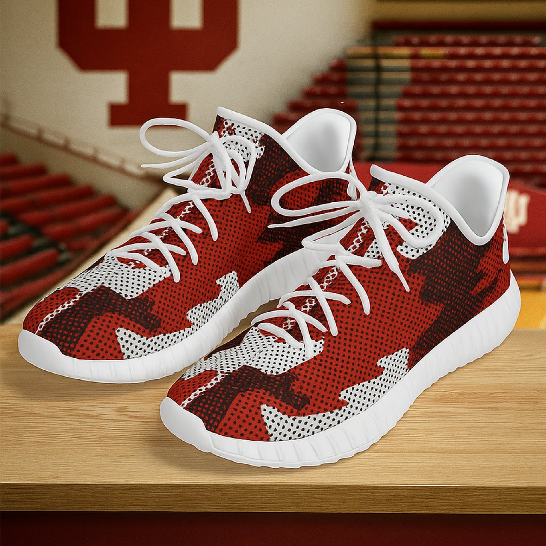 Red and white sneakers on a wooden surface with a blurred background