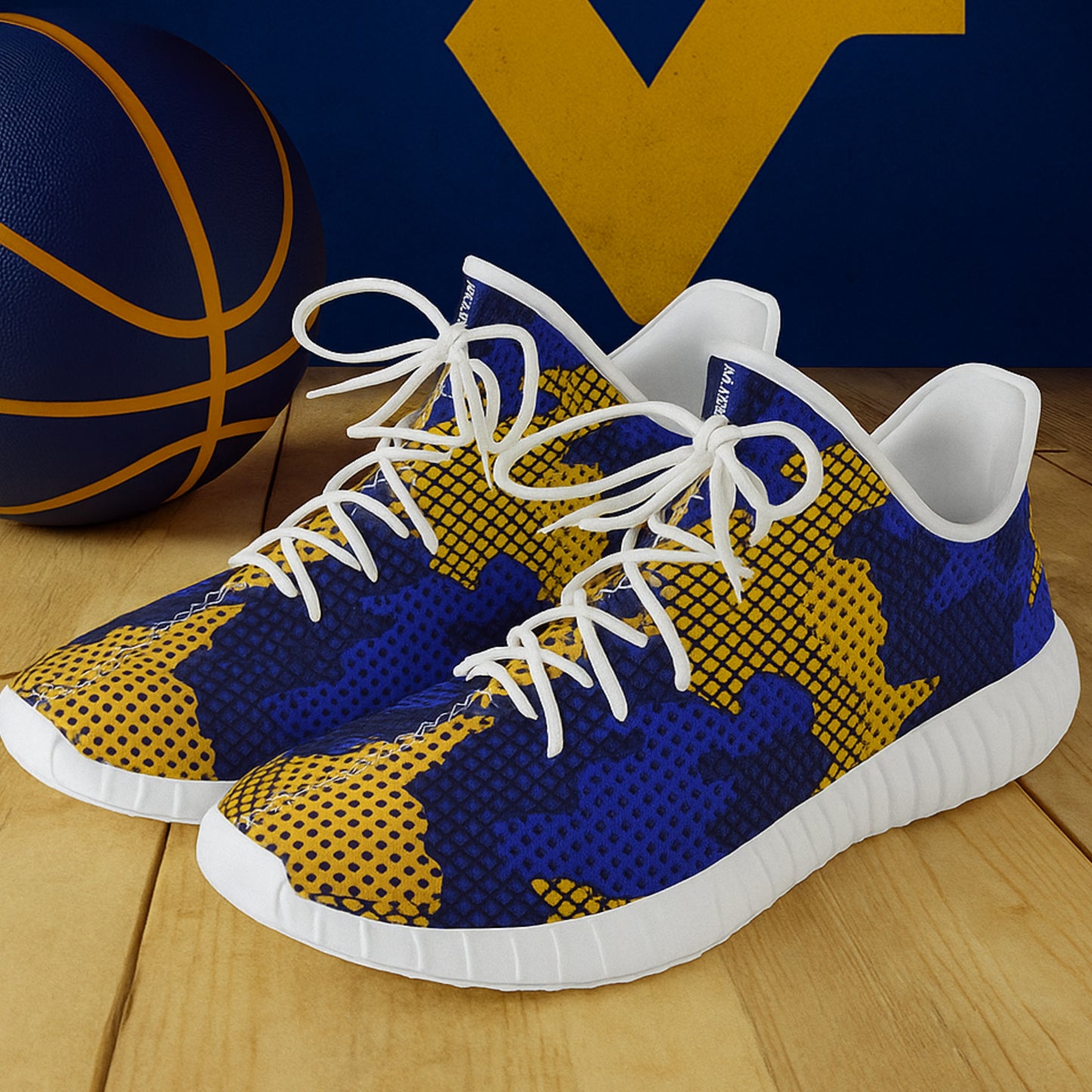 Blue and yellow sneakers with white laces on a wooden floor, next to a basketball.